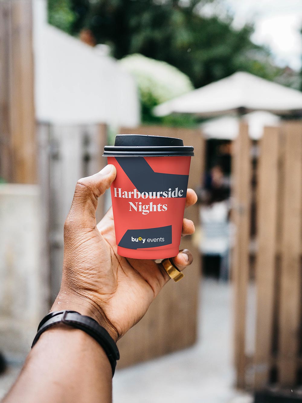 Buoy branding on a coffee cup
